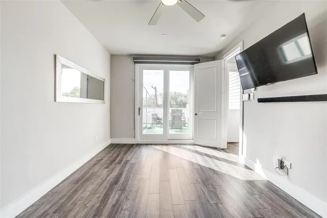 a view of livingroom with hardwood floor and window