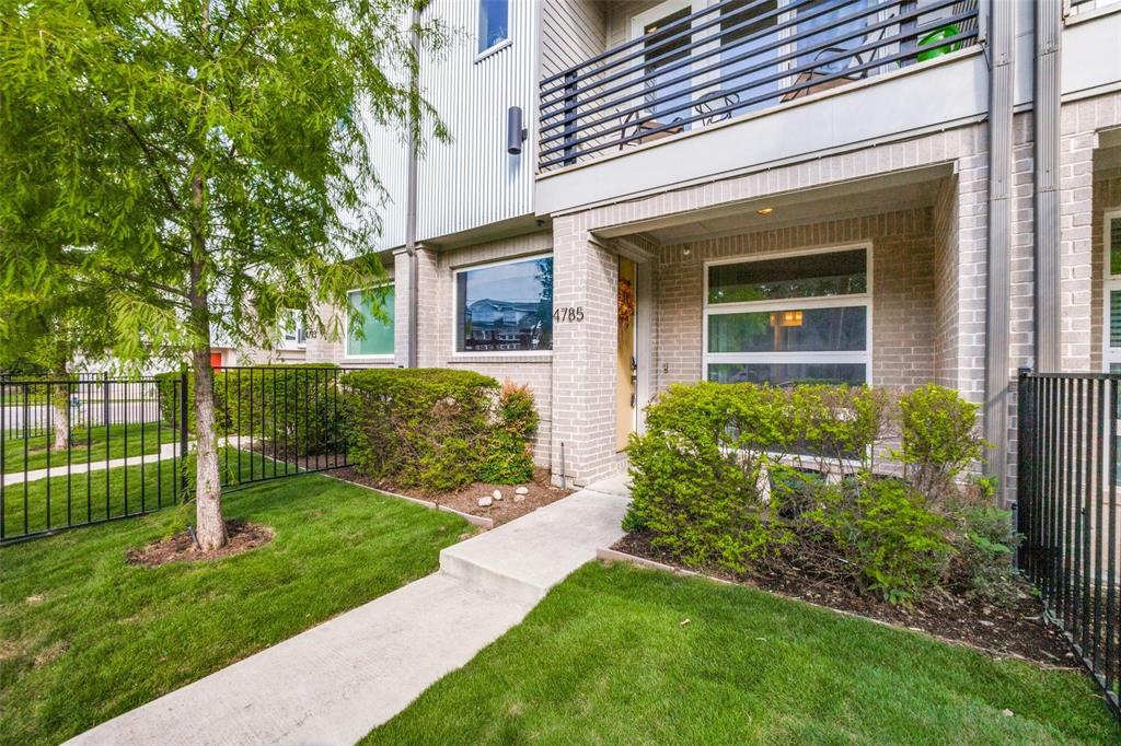 4785 Asher Place Dallas, TX 75204 - Photo 2 of 30 a front view of a house with a yard