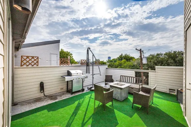 a view of a deck with furniture