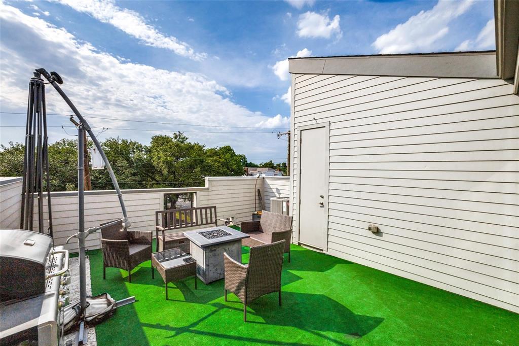 4785 Asher Place Dallas, TX 75204 - Photo 22 of 30 a couple of chairs sitting in backyard of house