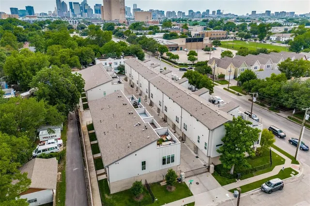 an aerial view of house with yard