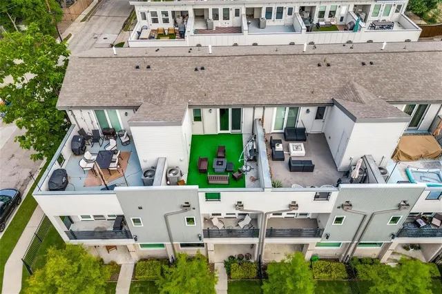a aerial view of a house with a garden and plants