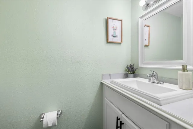 a view of room with closet and wooden floor