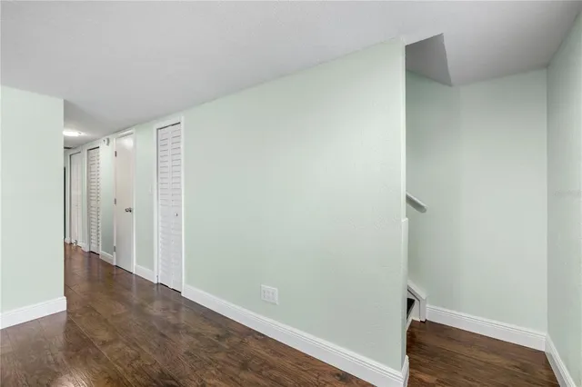 a bathroom with a sink toilet and a mirror