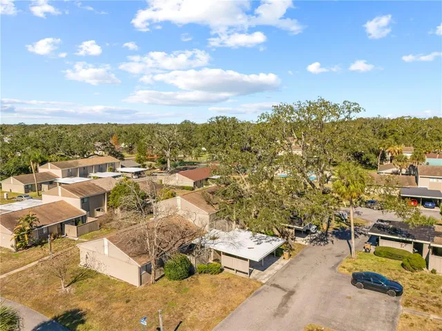 a view of a backyard of the house