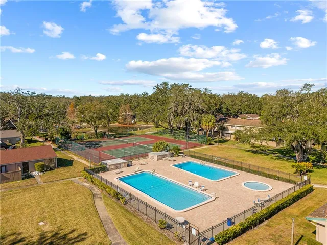 a view of garage and a car parked car