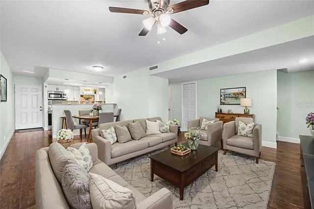 a large kitchen with stainless steel appliances granite countertop a lot of counter space