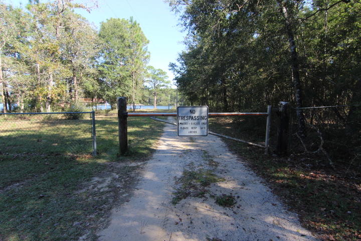 10 Spring Lake Road DeFuniak Springs, FL 32433 - Photo 5 of 14 a view of park with trees