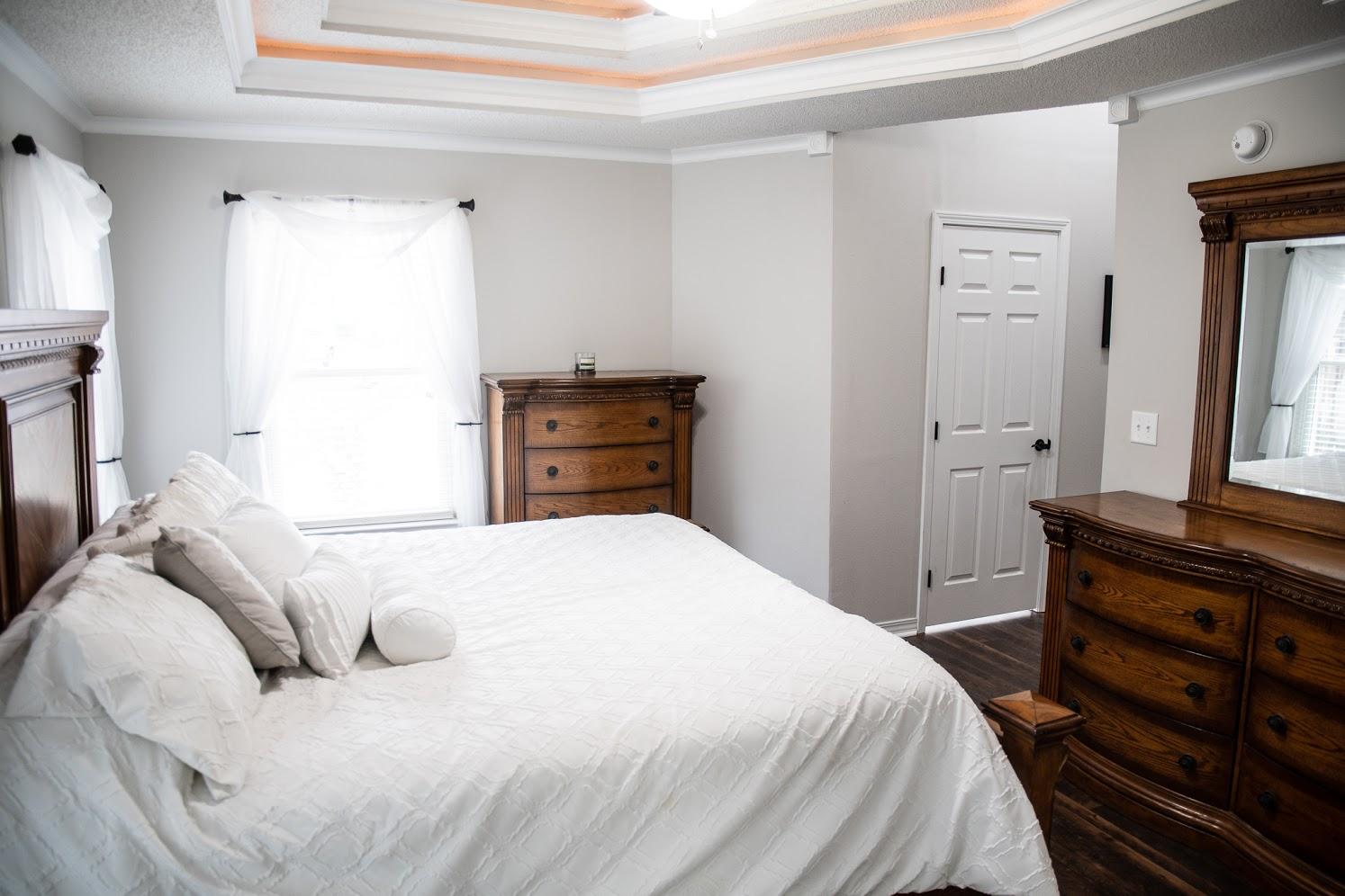 2802 Ping Lane Crestview, FL 32539 - Photo 14 of 30 a bedroom with a bed and a dresser