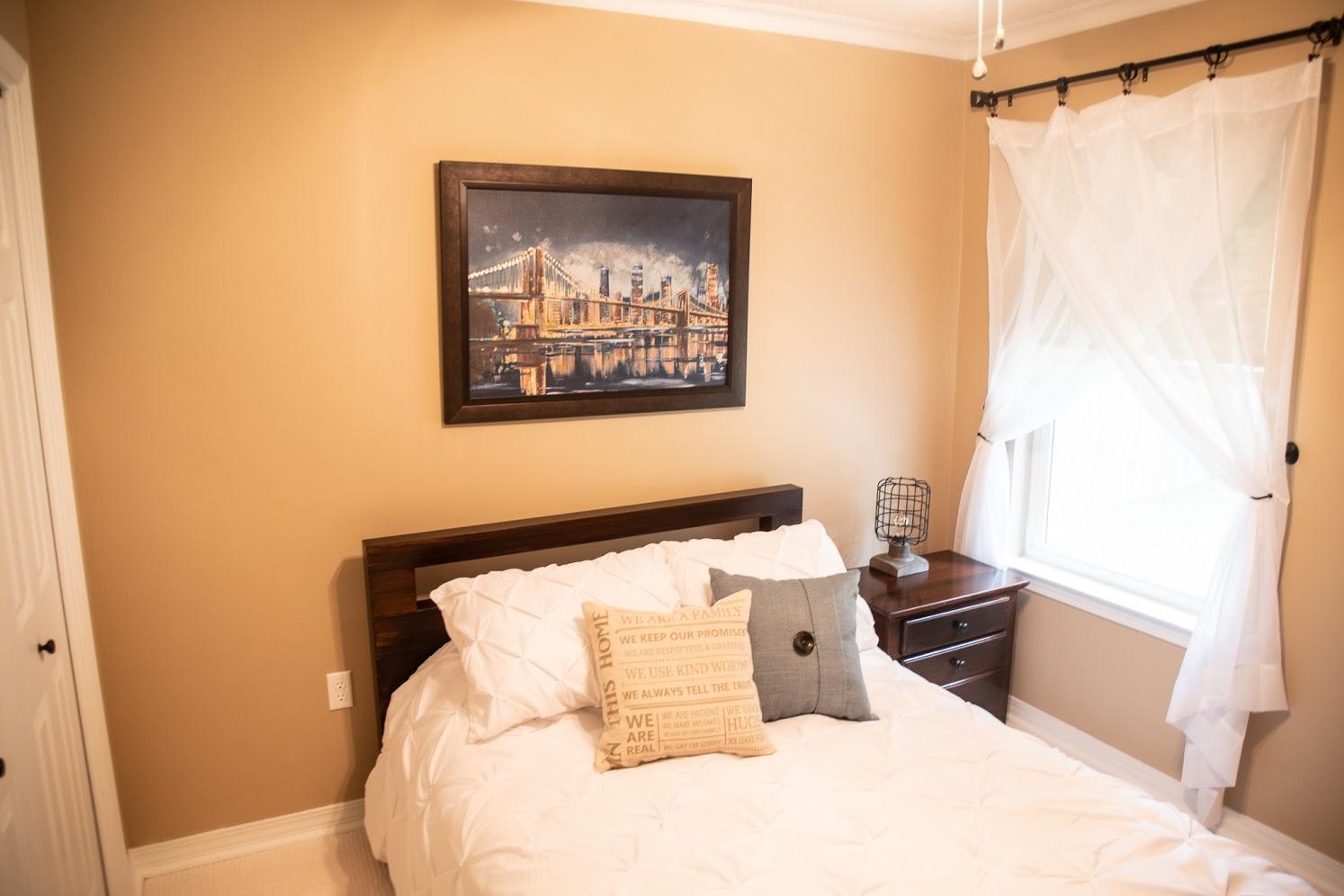 2802 Ping Lane Crestview, FL 32539 - Photo 24 of 30 a bedroom with a bed and a window