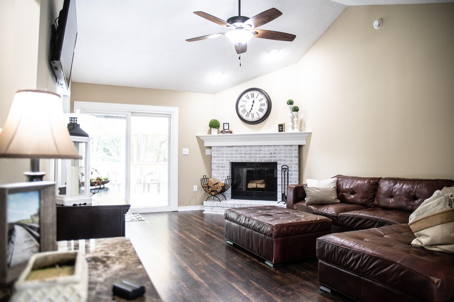 2802 Ping Lane Crestview, FL 32539 - Photo 5 of 30 a living room with furniture and a fireplace
