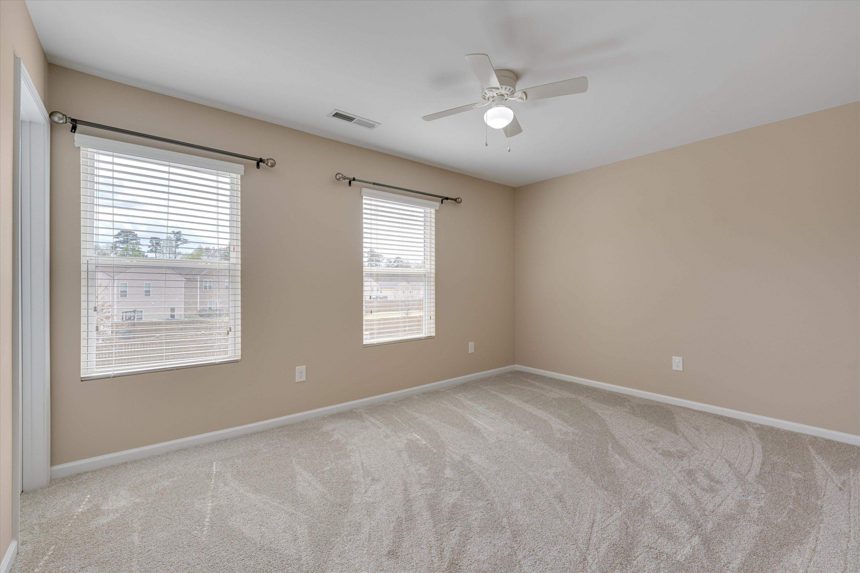 3717 Althorp Drive Raleigh, NC 27616 - Photo 20 of 23 a view of an empty room with a window