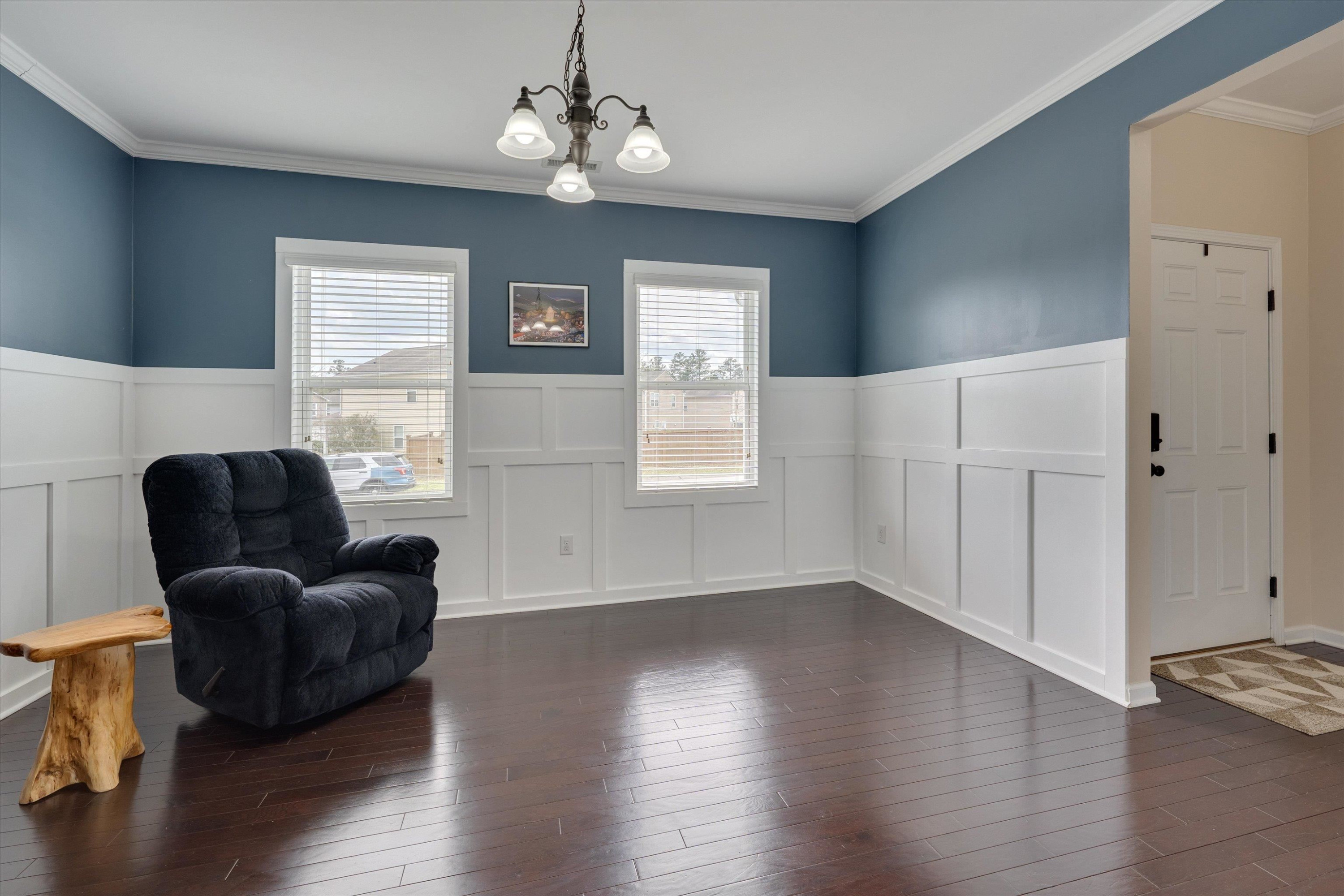 3717 Althorp Drive Raleigh, NC 27616 - Photo 2 of 23 a living room with furniture and wooden floor