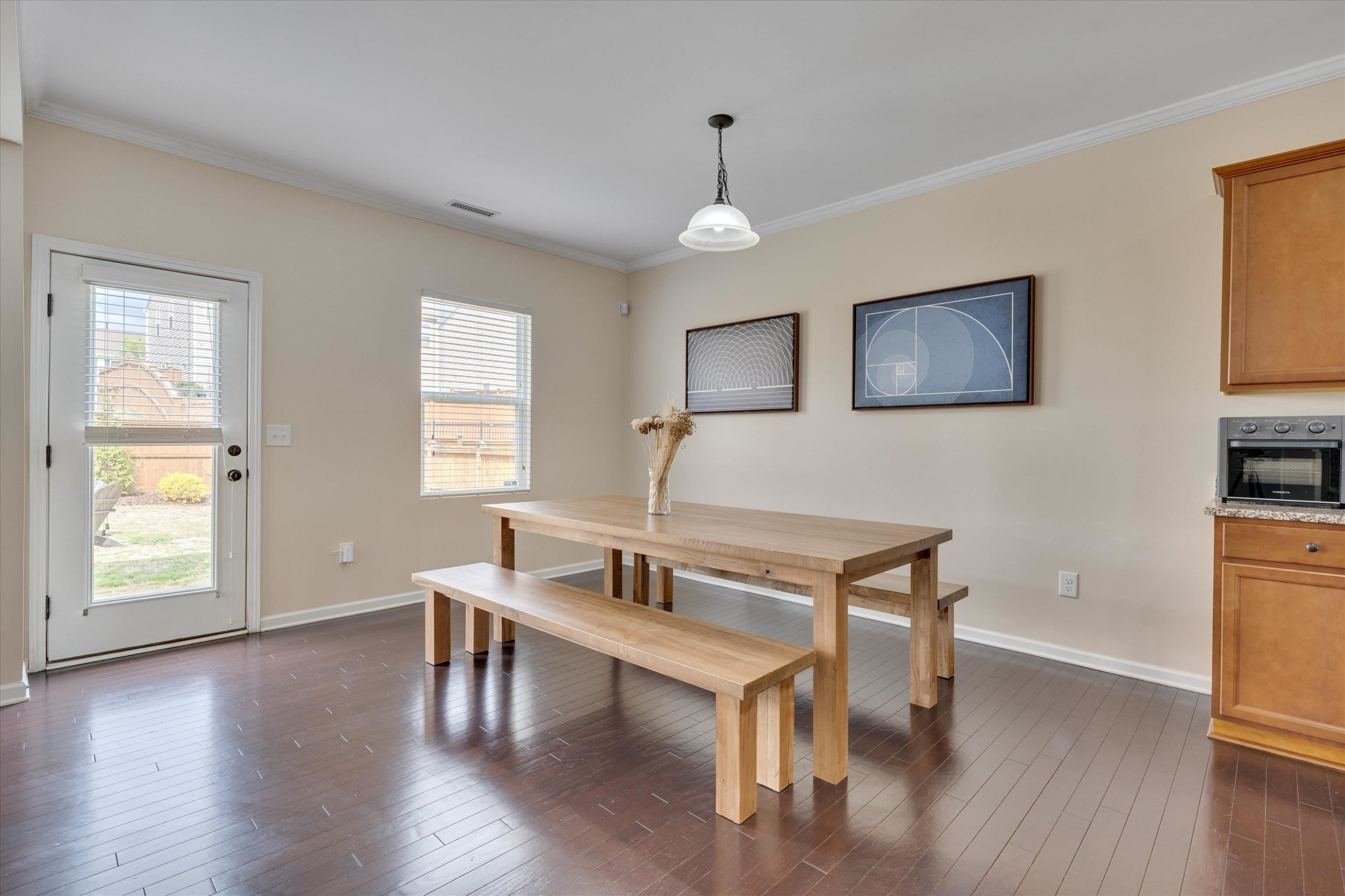 3717 Althorp Drive Raleigh, NC 27616 - Photo 8 of 23 a view of a livingroom with furniture window and wooden floor