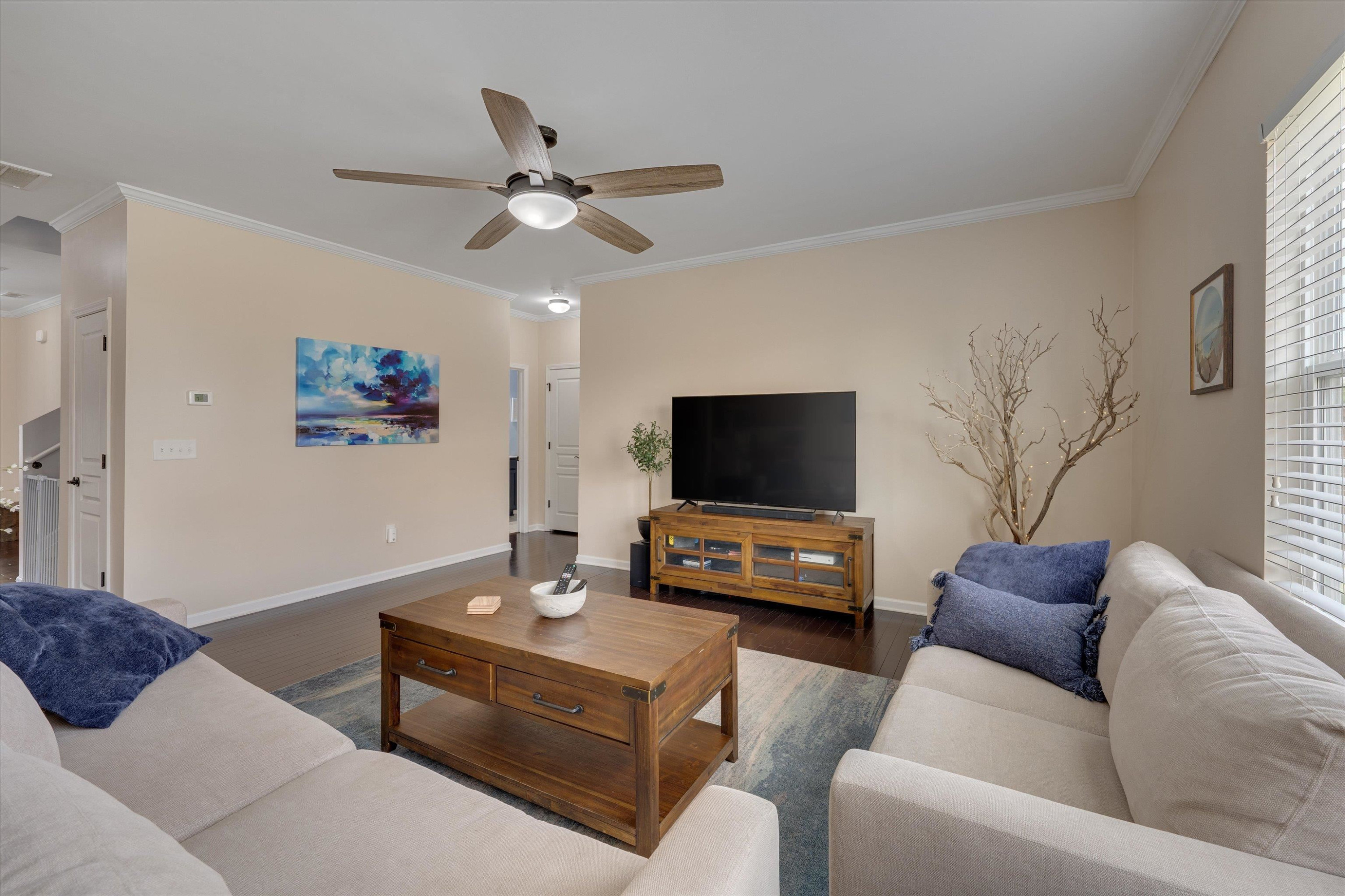 3717 Althorp Drive Raleigh, NC 27616 - Photo 10 of 23 a living room with furniture and a flat screen tv
