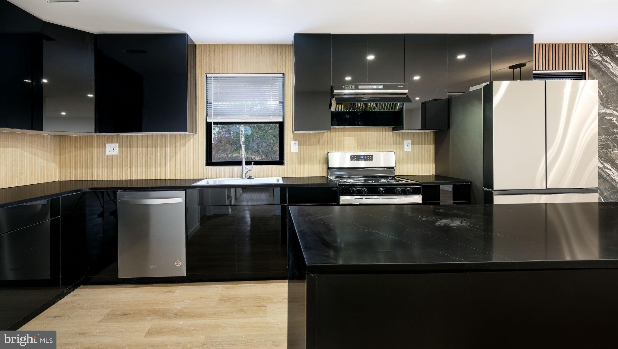 1617 Church Road Wyncote, PA 19095 - Photo 11 of 39 Sleek modern kitchen with elegant finishes.