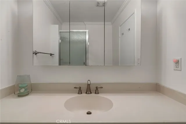 a view of a two chairs in the roof deck