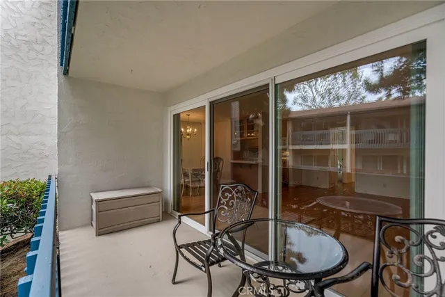 a front view of a house with glass windows