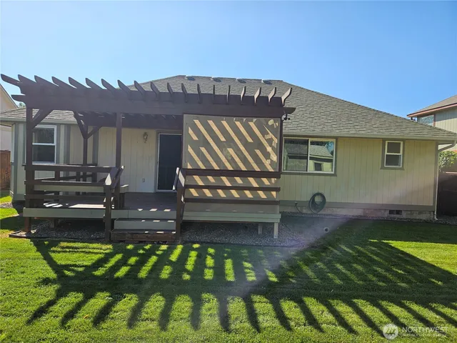 a view of a house with a garden