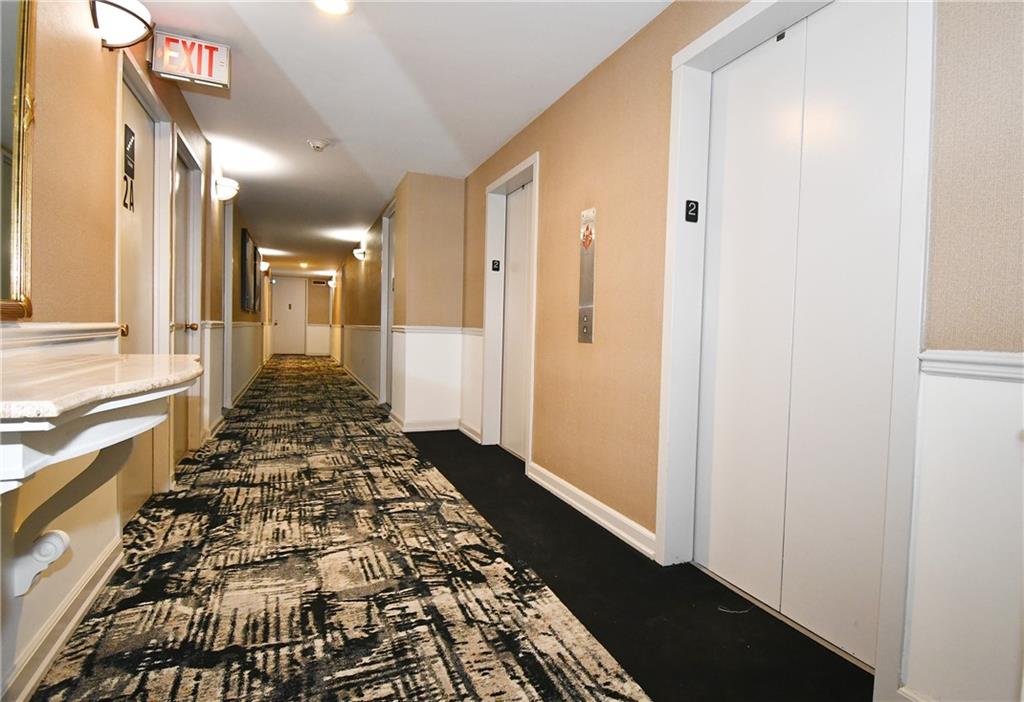 112 Washington Place, Unit 2G Pittsburgh, PA 15219 - Photo 6 of 26 a bathroom with a bathtub and a shower