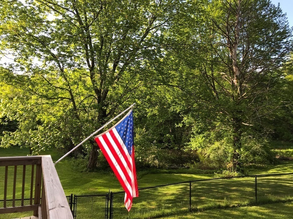 63 Kemp Street Groton, MA 01450 - Photo 18 of 24 a view of a yard with a small and trees