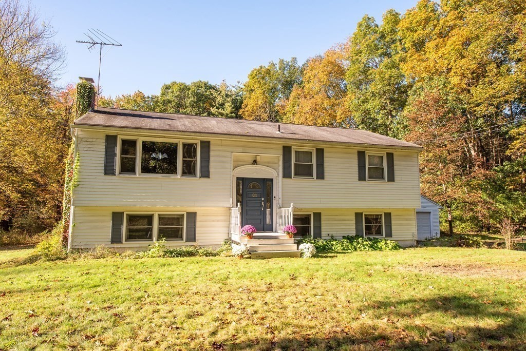 63 Kemp Street Groton, MA 01450 - Photo 20 of 24 a view of a house with a swimming pool