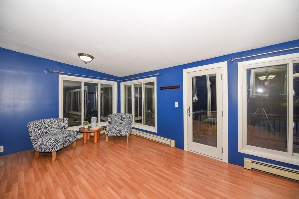 63 Kemp Street Groton, MA 01450 - Photo 6 of 24 a living room with furniture and wooden floor
