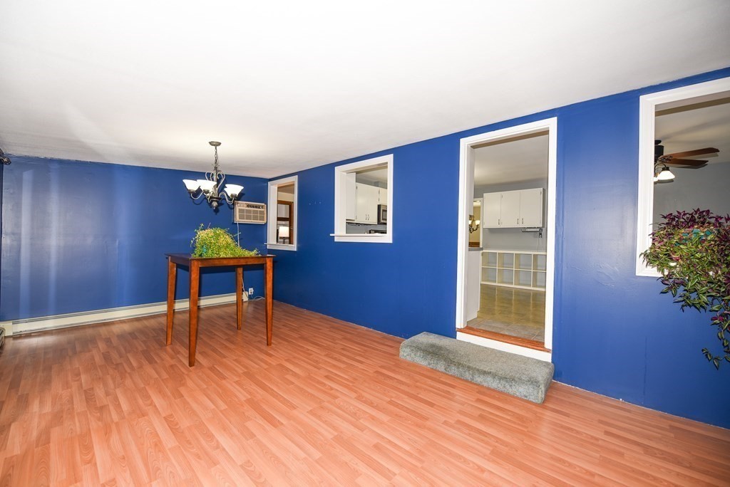 63 Kemp Street Groton, MA 01450 - Photo 7 of 24 a view of a livingroom with furniture and wooden floor