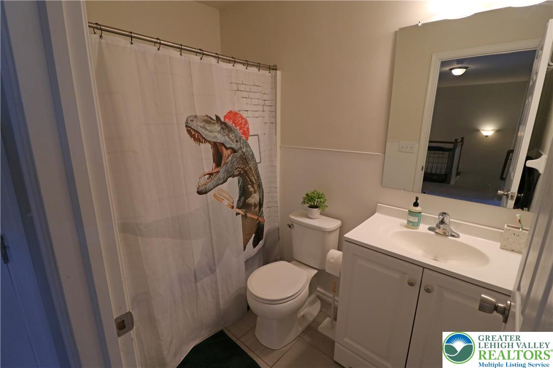 4502 Benjamin Court Emmaus, PA 18049 - Photo 38 of 53 Functional full bathroom featuring a tub and shower combination with a unique curtain.