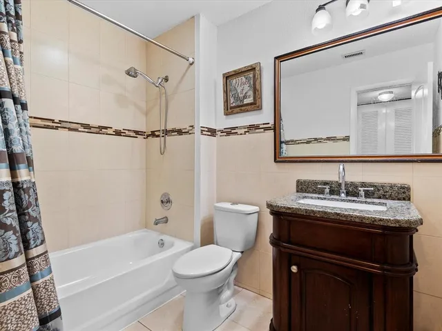 a bathroom with a sink a toilet and a bathtub