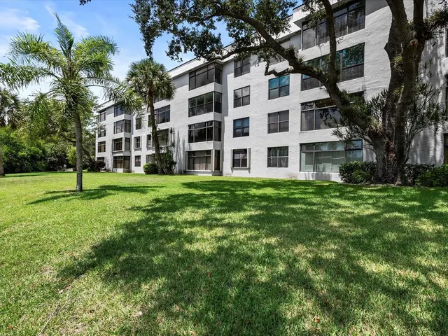 a view of building with yard
