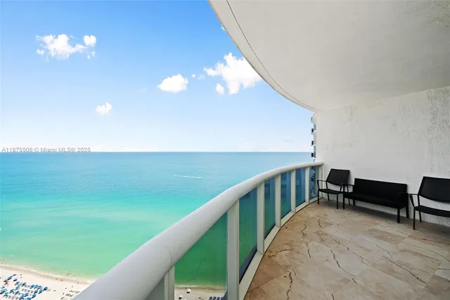 a view of a balcony with an outdoor space