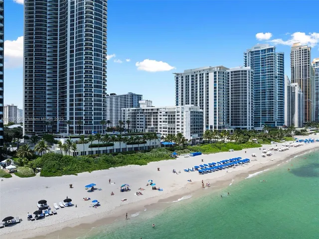 a view of a city with tall buildings
