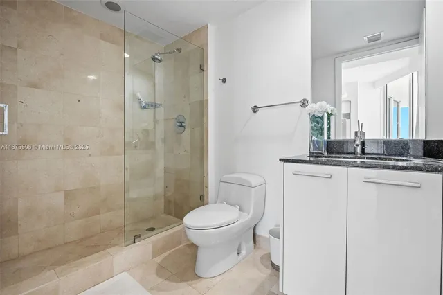 a view of a balcony with dining area