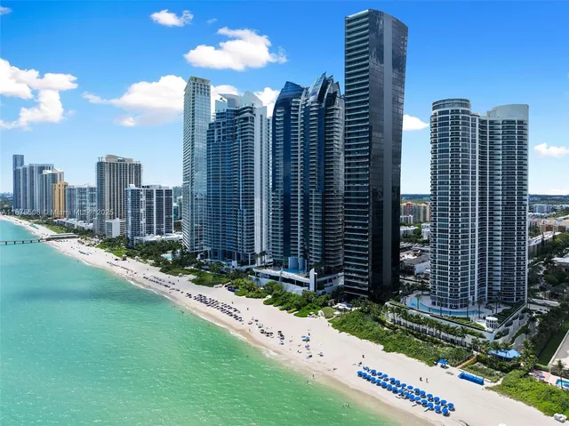 a view of a city with tall buildings