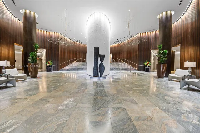 a view of a hall with entryway and hall