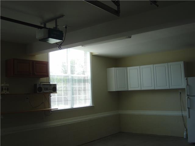 955 Rip Steele Road Columbia, TN 38401 - Photo 11 of 14 CABINETS AND PLENTY OF STORAGE IN GARAGE