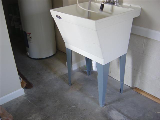 955 Rip Steele Road Columbia, TN 38401 - Photo 12 of 14 UTILITY SINK LOCATED IN THE GARAGE PERFECT PLACE TO DO CLEAN UP BEFORE ENTERING INTO HOME