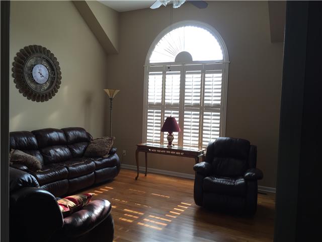 955 Rip Steele Road Columbia, TN 38401 - Photo 2 of 14 Beautiful great room with custom blinds & cut outs to display your antiques. Hardwood floors flow from the great room to the kitchen and continue into the sunroom.