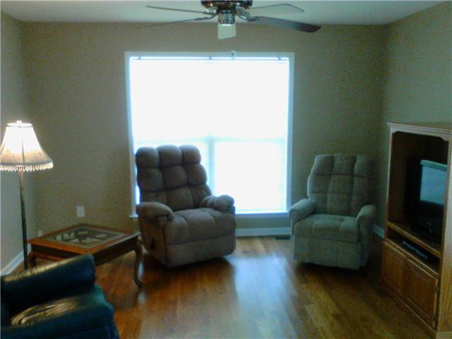 955 Rip Steele Road Columbia, TN 38401 - Photo 3 of 14 Perfect sunroom off the kitchen to relax and sip your morning coffee or tea. Large deck for entertaining is off the sunroom.