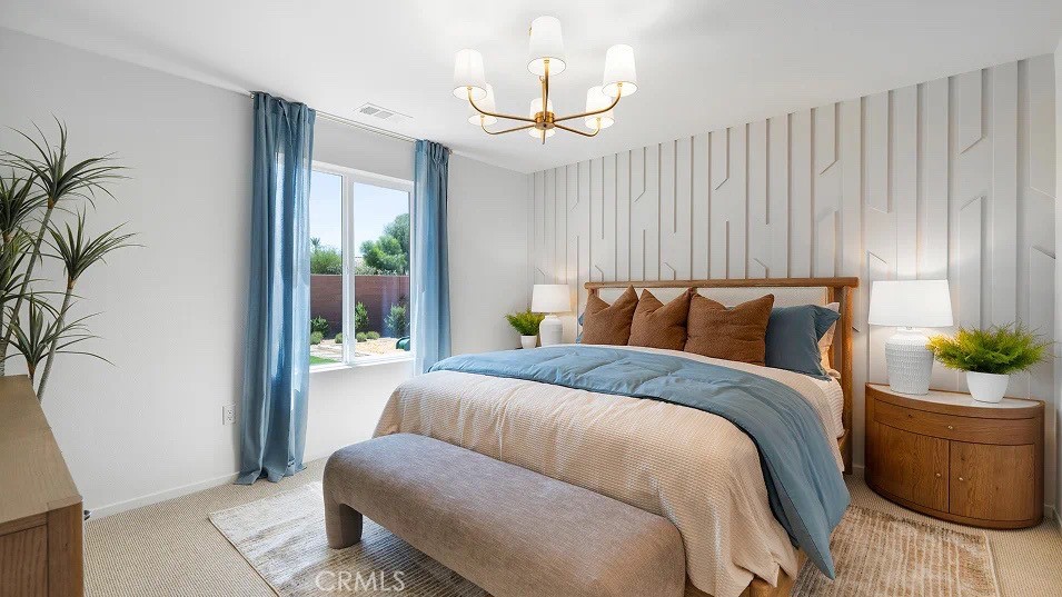 79327 Valor Lane Indio, CA 92203 - Photo 11 of 19 a bedroom with bed and a window