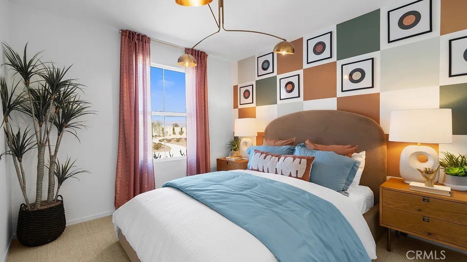 79327 Valor Lane Indio, CA 92203 - Photo 8 of 19 a bedroom with a bed and a window