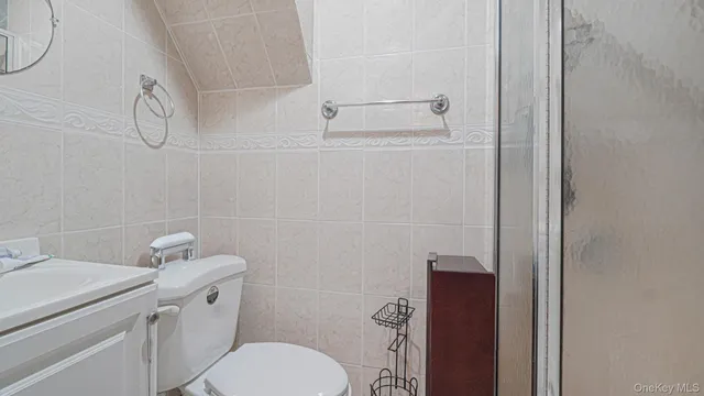 a car parked in front of a brick building