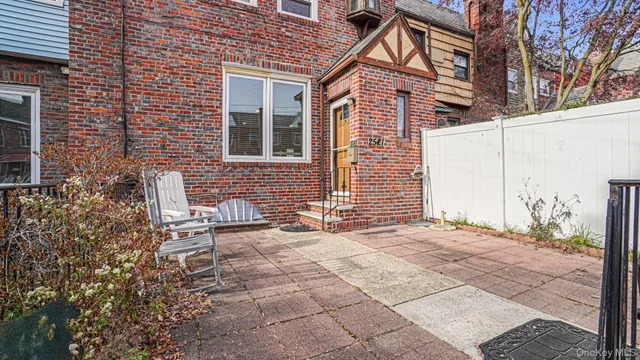 a bedroom with a bed and a television