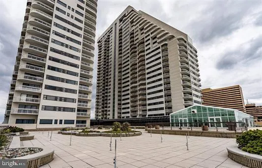 a view of a living room and a balcony