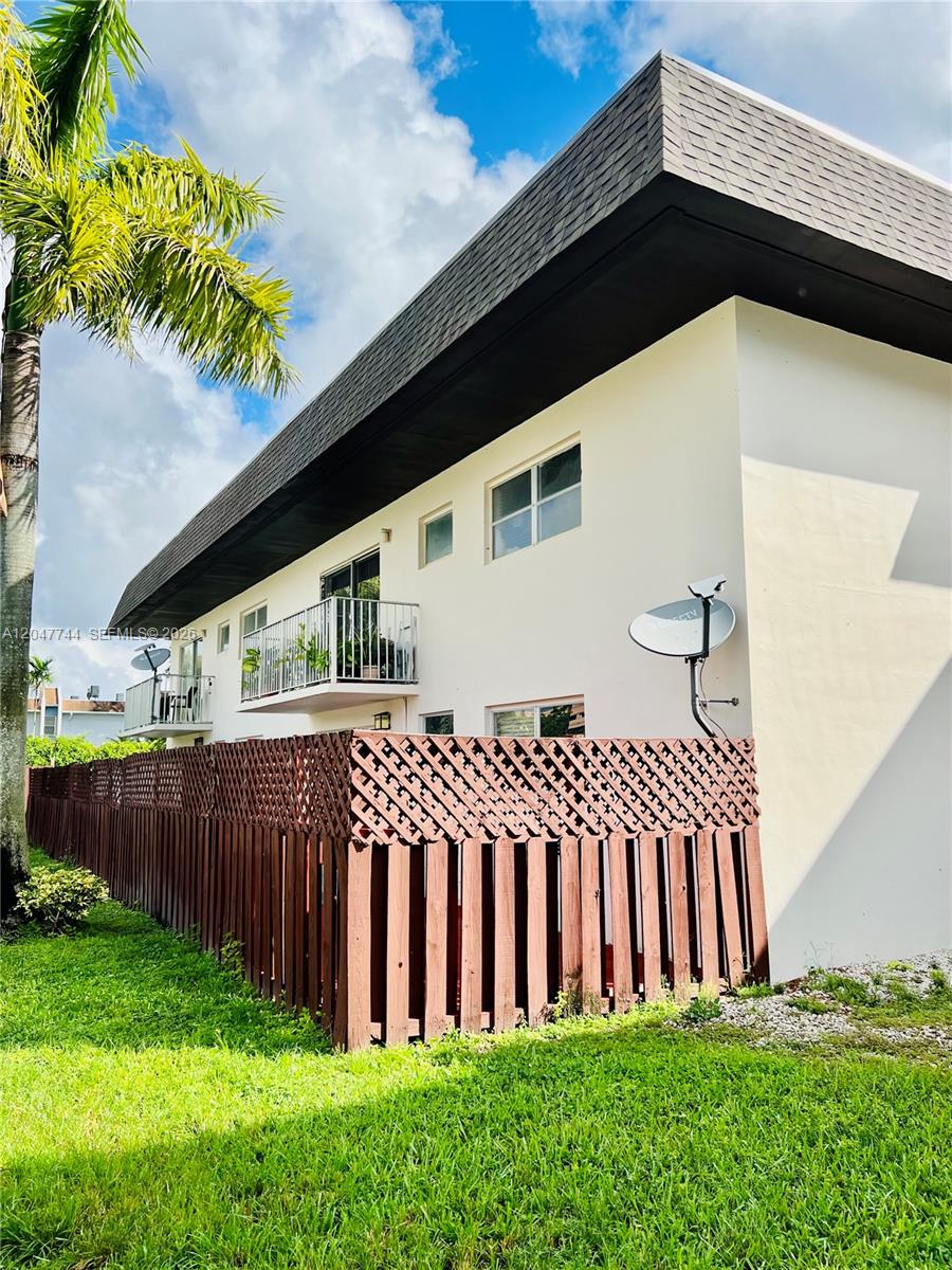 8601 Southwest 94th Street, Unit 105W Miami, FL 33156 - Photo 21 of 24 Fenced Patio / Back Entrance to Patio.