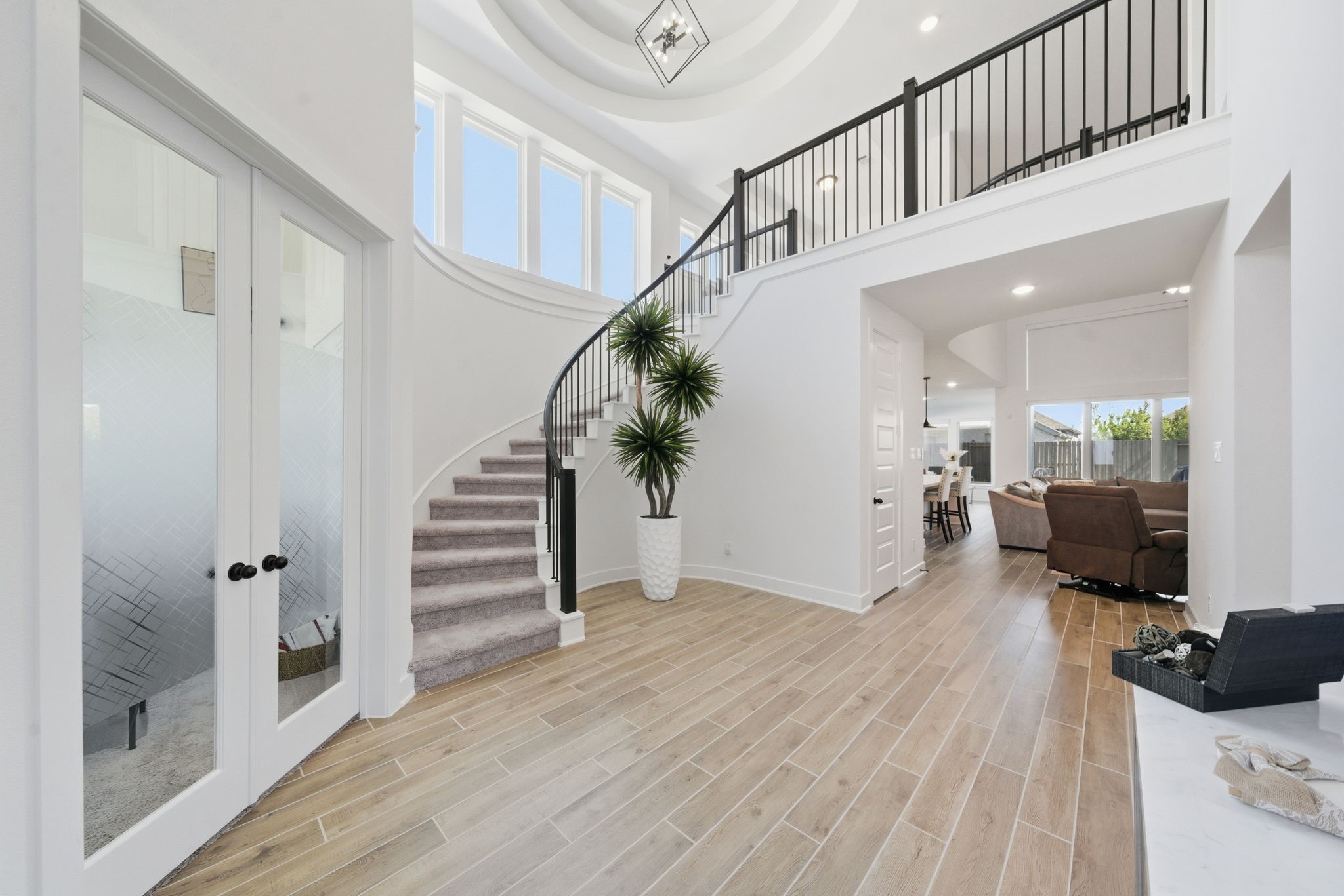10438 Rigel Rdg Way Richmond, TX 77406 - Photo 3 of 34 a view of entryway and hall with wooden floor