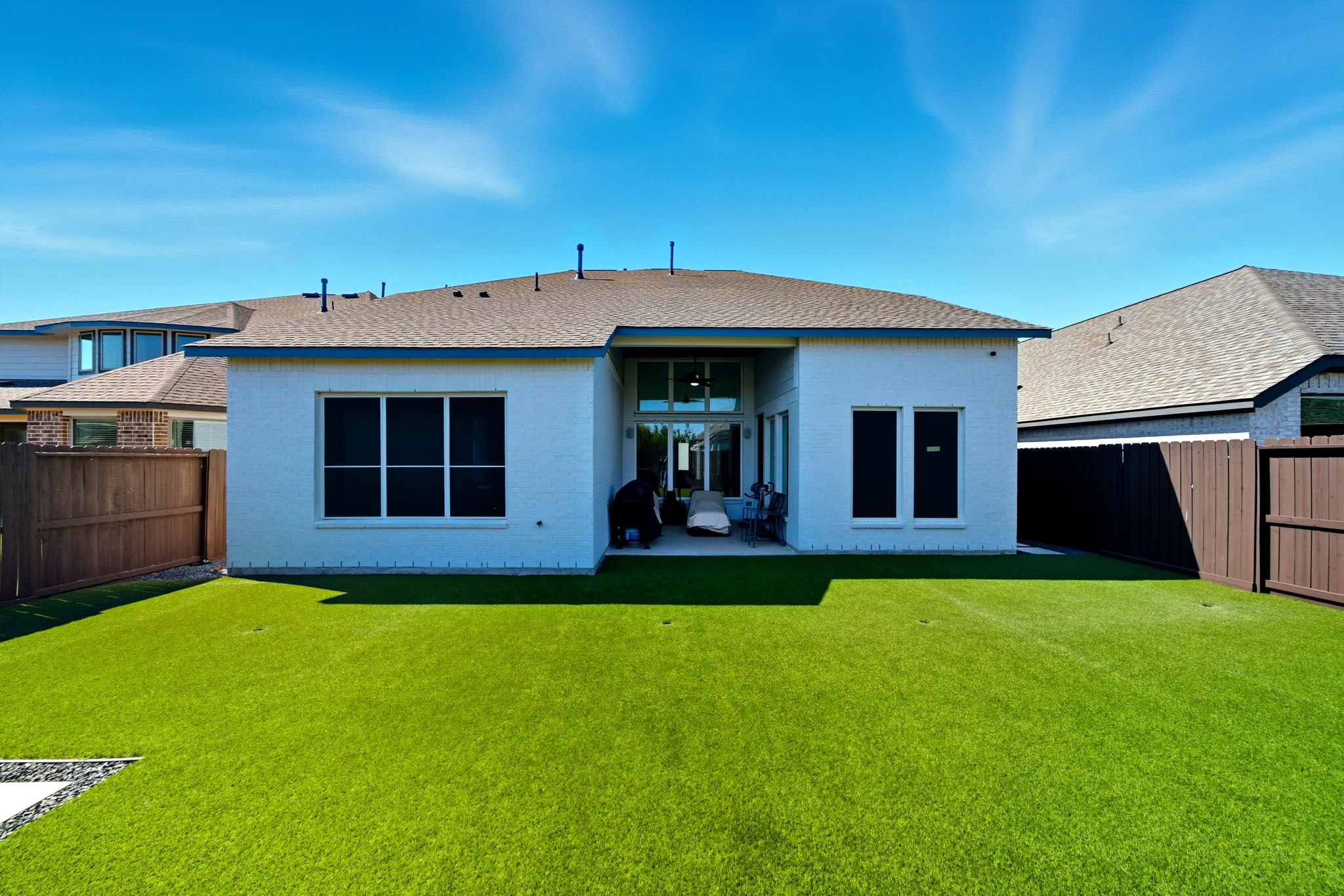 10438 Rigel Rdg Way Richmond, TX 77406 - Photo 32 of 34 a view of a house with a yard and sitting area
