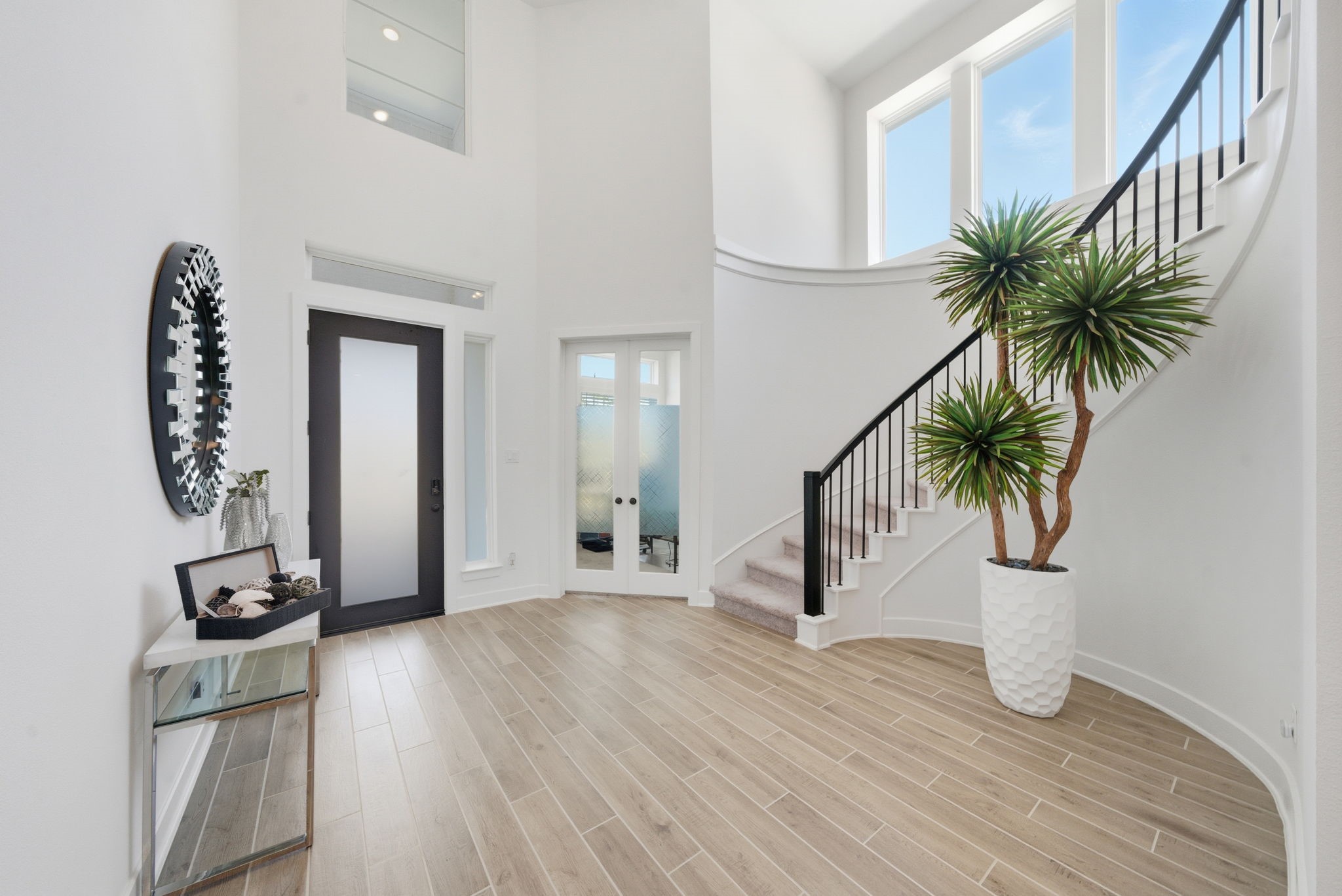 10438 Rigel Rdg Way Richmond, TX 77406 - Photo 4 of 34 a view of a hallway with wooden floor and entryway