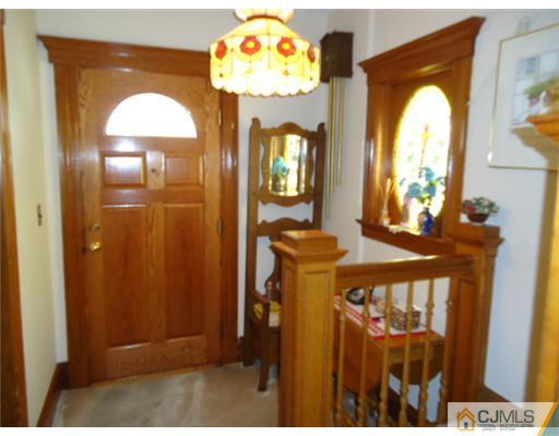 242 Rector Street Perth Amboy, NJ 08861 - Photo 2 of 18 a view of a entryway door with wooden floor